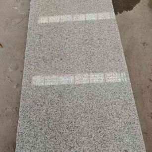 绥化芝麻白光面毛板