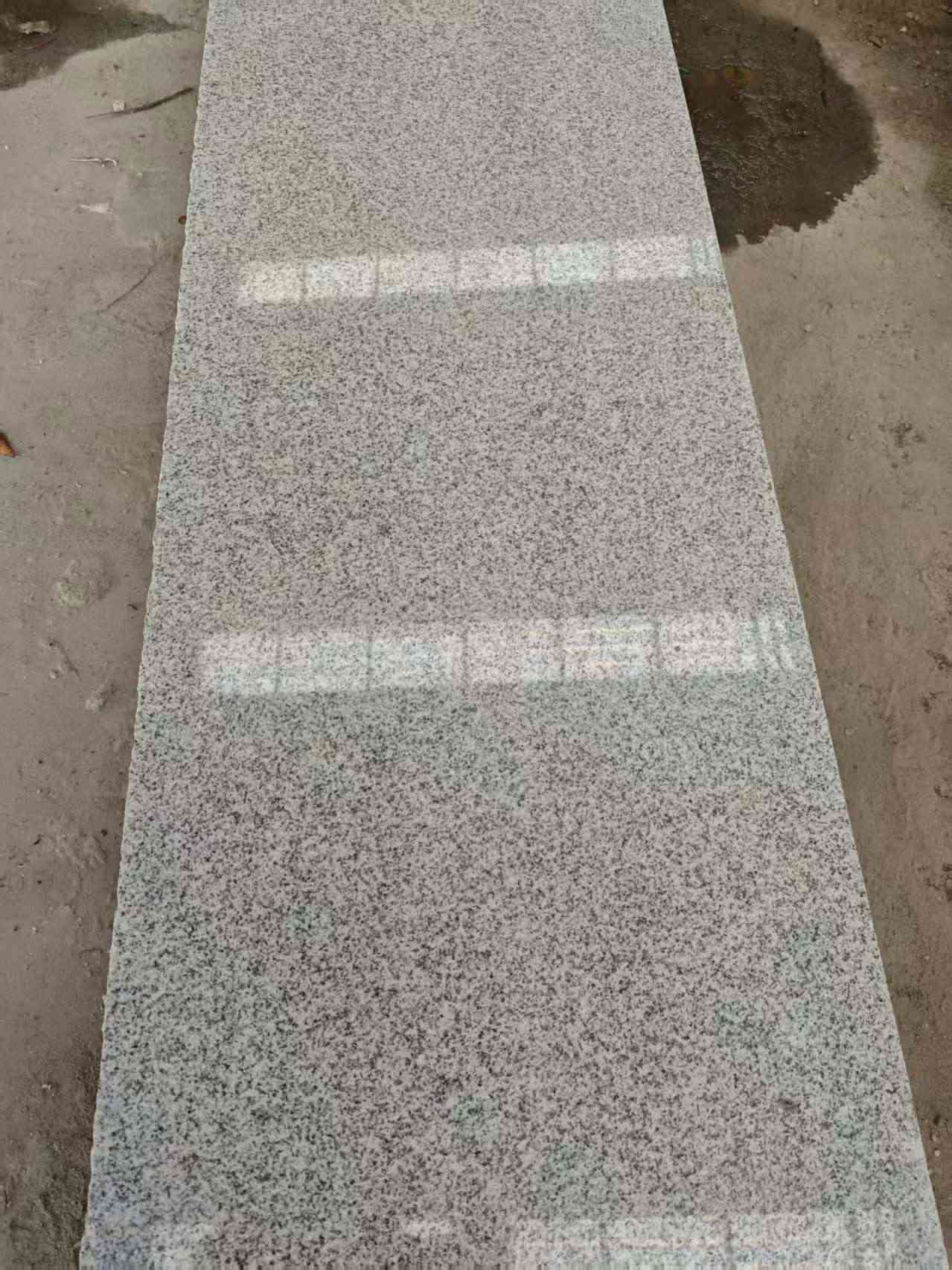 绥化芝麻白光面毛板